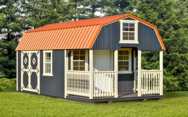 This black lofted cabin showcases a red metal roof, a white front door opening to a covered porch, four white-trimmed windows, and a white-trimmed double door on the side, combining practicality with rustic charm.