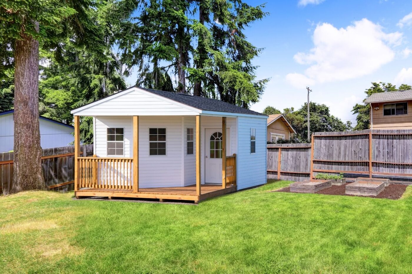 white cabin small affordable homes